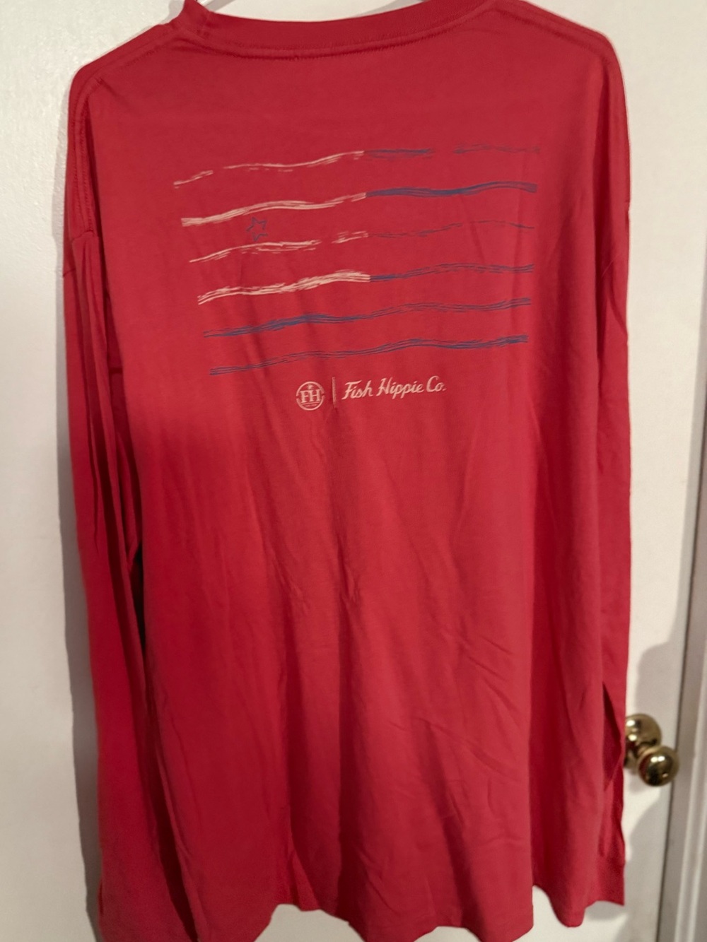 Fish Hippie Co. Long Sleeve Graphic Tee - Coral Red with American flag design